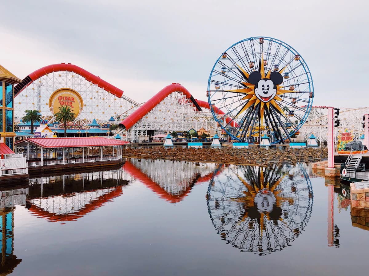 Pixar Pal-A-Round Ferris wheel reflected in the water at Disney California Adventure