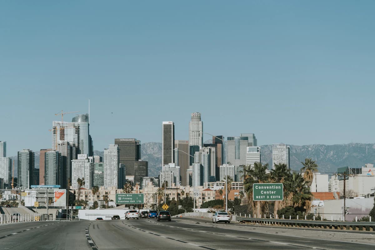 Freeway traffic heading toward the downtown Los Angeles skyline