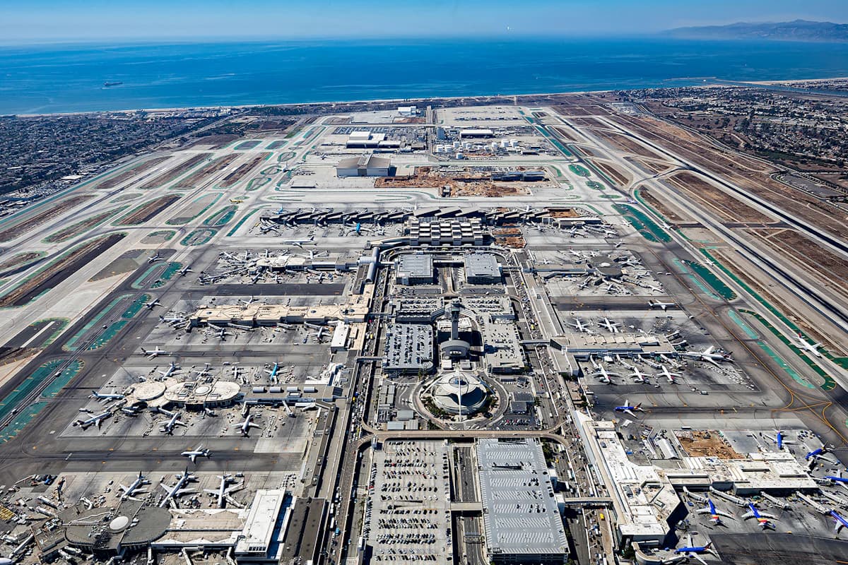 Aerial view of LAX airport with the ocean behind